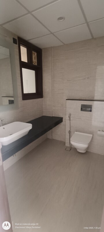 Kitchen in 4 BHK Apartment at Eros Edenwood Towers, Lakkarpur – for Sale