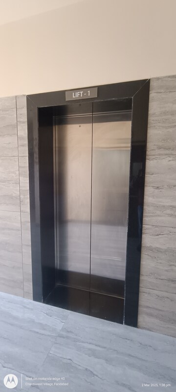 Kitchen in 4 BHK Apartment at Eros Edenwood Towers, Lakkarpur – for Sale