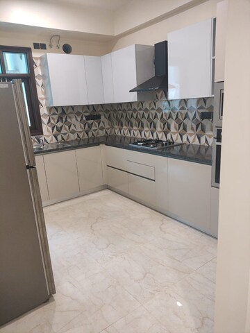 Kitchen in 4 BHK Apartment at Eros Edenwood Towers, Lakkarpur – for Rent