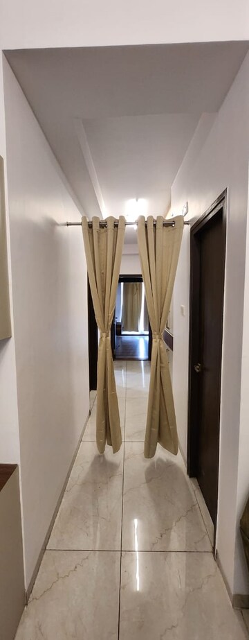 Building Lobby in 3 BHK Apartment at Chandra Panorama, Sushant Golf City – for Rent