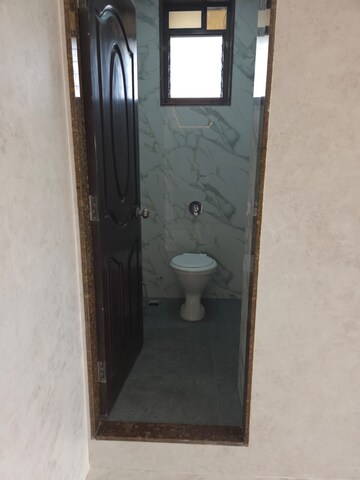 Bathroom in 2 BHK Apartment at Maitri Siya Enclave, Malad West – for Sale