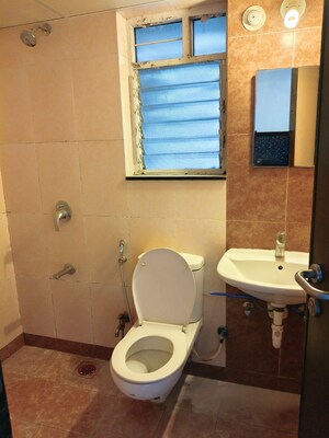 Bathroom in 3 BHK Apartment at Paranjape Schemes Yuthika, Baner – for Rent