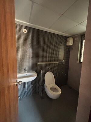 Bathroom in 1.5 BHK Apartment at Lodha Palava City Lakeshore Greens, Dombivli East – for Rent
