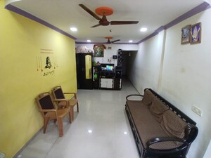 Living Room in 1 BHK Apartment at Kopar Khairane – for Sale
