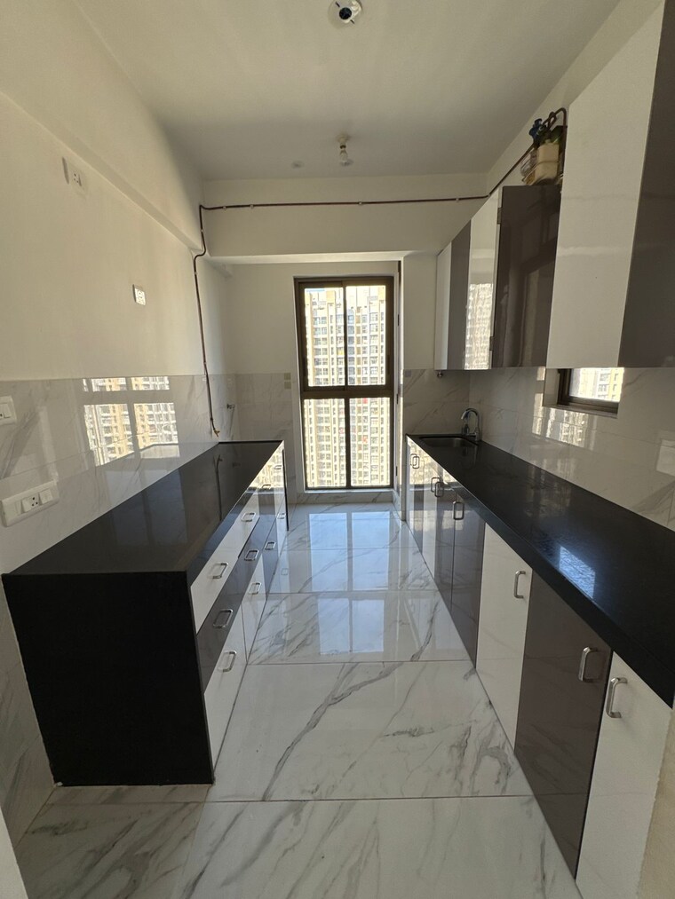 Kitchen, raymond-ten-x-habitat 2 Bedroom 635 Sq.Ft. Apartment In Pokhran Road No Two Thane 9441561