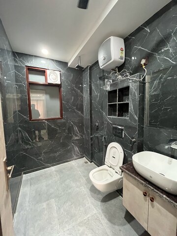 Bathroom in 2 BHK Builder Floor at Hong Kong Bazaar, Sector 56 – for Rent