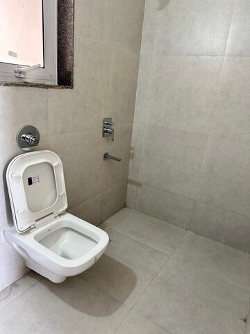 Bathroom in 1 BHK Apartment at Puranik City, Kasarvadavali – for Rent