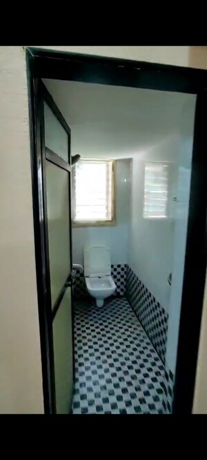 Bathroom in 2 BHK Apartment at Sukumar CHS, Vile Parle East – for Rent
