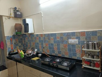 Kitchen in 1 BHK Apartment at Mantri Serene, Goregaon East – for Rent
