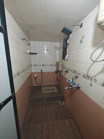 Bathroom in 2 BHK Apartment at Soham Apartments Seawoods, Seawoods – for Rent