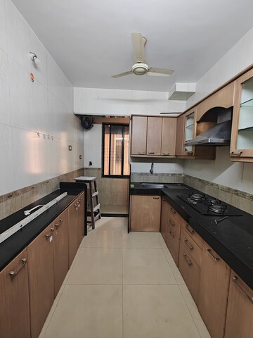 Kitchen in 2 BHK Apartment at Soham Apartments Seawoods, Seawoods – for Rent