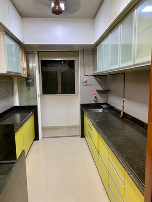 Kitchen in 2 BHK Apartment at Azad Nagar Sangam CHS, Andheri West – for Rent