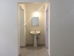 Bathroom in 2 BHK Apartment at Royal Classic Co Op Society, Andheri West – for Sale