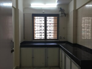 Kitchen in 2 BHK Apartment at Royal Classic Co Op Society, Andheri West – for Sale