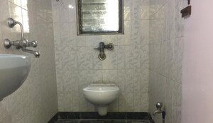 Bathroom in 2 BHK Apartment at Royal Classic Co Op Society, Andheri West – for Sale