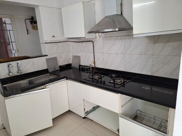 Kitchen in 3 BHK Apartment at Kolte Patil Langston, Kharadi – for Rent