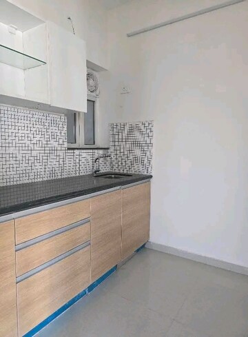 Kitchen in 1 BHK Apartment at Omkar Signet, Malad East – for Rent