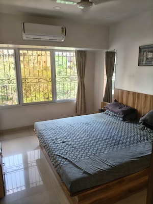 Bedroom in 3 BHK Apartment at Samartha Aangan, Andheri West – for Rent