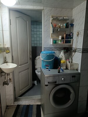 Bathroom in 1 BHK Apartment at Om Krishna CHS, Dahisar East – for Rent