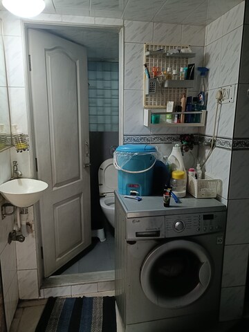 Bathroom in 1 BHK Apartment at Om Krishna CHS, Dahisar East – for Rent