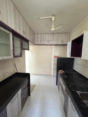 Kitchen in 2 BHK Apartment at DSK Meghmalhar Phase I, Sinhagad Road – for Sale