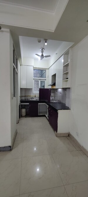 Kitchen in 2 BHK Apartment at JKG Palm Court, Sector 16c Greater Noida – for Rent