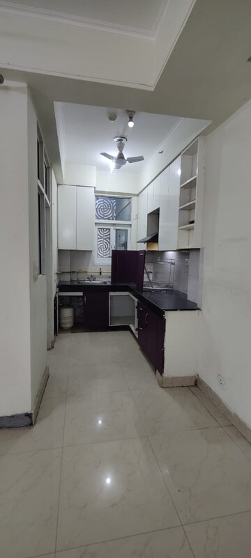 Kitchen in 2 BHK Apartment at JKG Palm Court, Sector 16c Greater Noida – for Rent