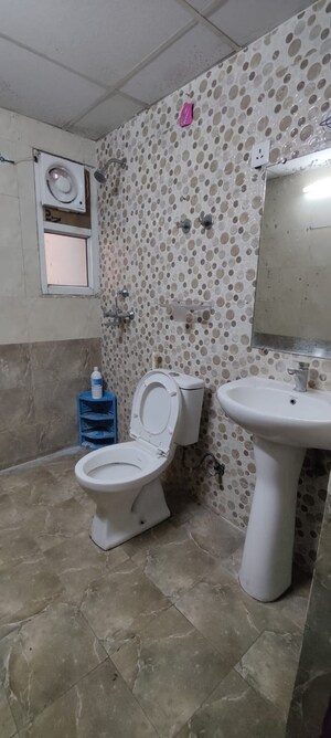 Bathroom in 2 BHK Apartment at JKG Palm Court, Sector 16c Greater Noida – for Rent