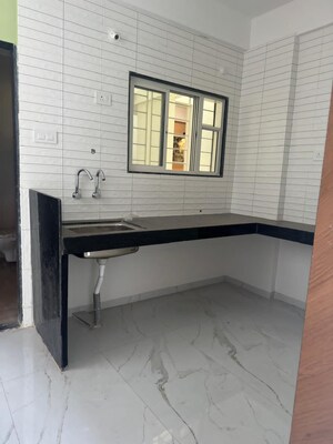 Kitchen in 1 BHK Apartment at Wadgaon Sheri – for Rent