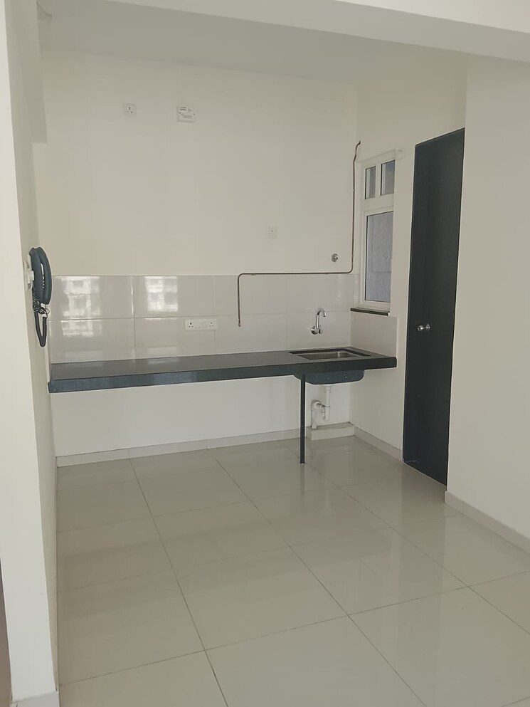 Kitchen, kolte-patil-life-republic-universe 2 Bedroom 630 Sq.Ft. Apartment In Hinjewadi Pune 9442516