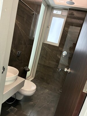 Bathroom in 1 BHK Apartment at Aurum Q Residences, Ghansoli – for Rent