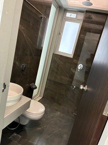 Bathroom in 1 BHK Apartment at Aurum Q Residences, Ghansoli – for Rent
