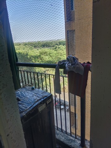 Balcony in 2 BHK Apartment at Nav Highland CHS, Balkum Pada – for Sale