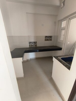 Kitchen in 3 BHK Apartment at Shri Radha Aqua Garden, Sector 16b Greater Noida – for Sale