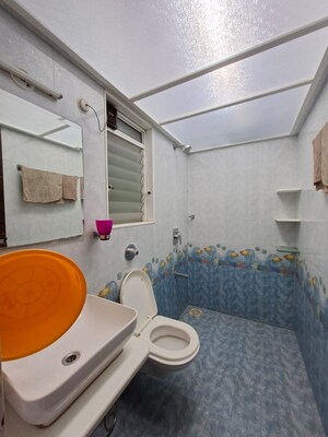 Bathroom in 2 BHK Apartment at Romell Shraddha, Borivali West – for Sale