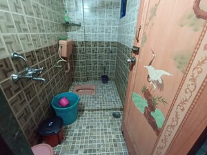 Bathroom in 2 BHK Apartment at Kopar Khairane – for Sale