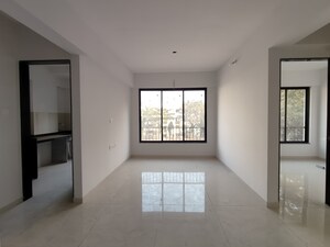 Living Room in 2 BHK Apartment at Dahisar West – for Sale