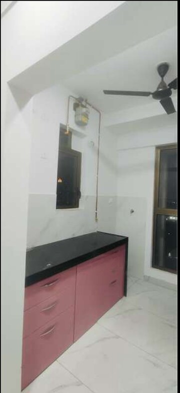 Kitchen in 1 BHK Apartment at Raymond Ten X Habitat, Pokhran Road No Two – for Rent