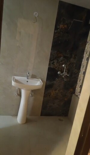 Bathroom in 2 BHK Apartment at VIctoryone Amara, Sector 16 Greater Noida – for Sale
