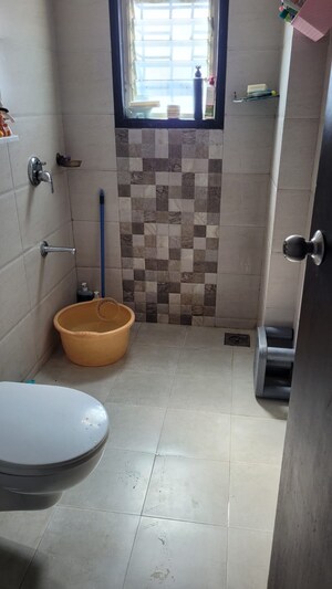 Bathroom in 2 BHK Apartment at Jhamtani Ace Almighty Phase I, Wakad – for Rent