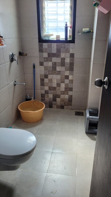 Bathroom in 2 BHK Apartment at Jhamtani Ace Almighty Phase I, Wakad – for Rent