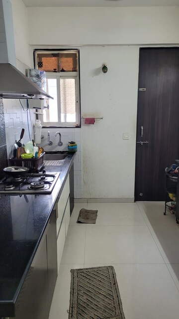 Kitchen in 2 BHK Apartment at Jhamtani Ace Almighty Phase I, Wakad – for Rent