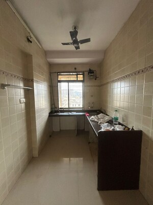 Kitchen in 2 BHK Apartment at Ghodbunder Road – for Rent