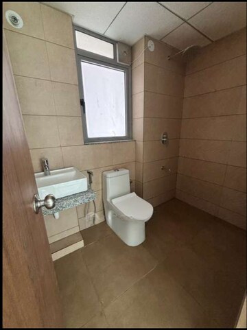 Bathroom in 1 BHK Apartment at Kalpataru Immensa B, Kolshet Road – for Rent