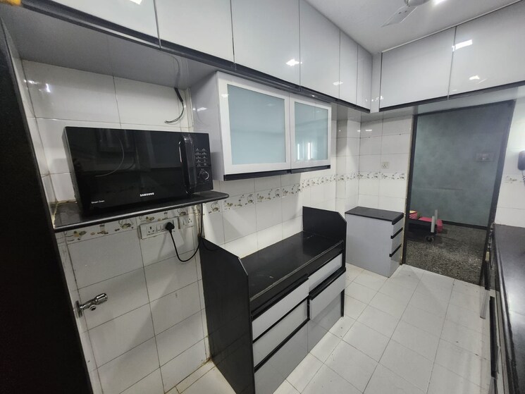 Master Bedroom, dheeraj-ganga 2 Bedroom 660 Sq.Ft. Apartment In Malad West Mumbai 9443264