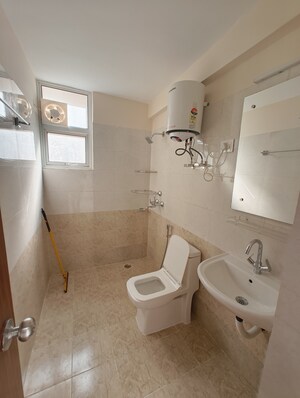 Bathroom in 2 BHK Apartment at Shree Vardhman Green Court, Sector 90 – for Rent