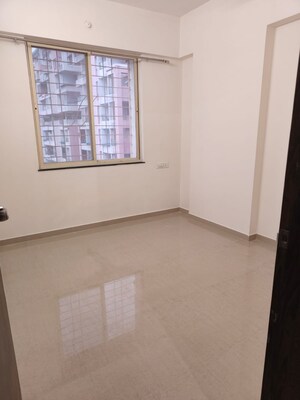 Room in 2 BHK Apartment at LS Mehetre Laxmi Deep, Wakad – for Rent