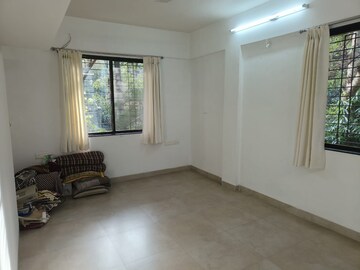 Bedroom in 2 BHK Apartment at Prasad Apartment Dahanukar Colony, Kothrud – for Sale