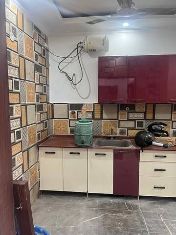 Kitchen in 3 BHK Builder Floor at Kailash Colony – for Sale