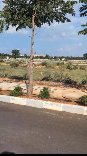 Plot Area in  Plot at Newmark Gardenia, Thummaloor – for Sale